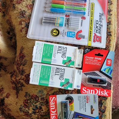 Smalls New mechanical pencils, wasp/bee sting swabs, flash drives