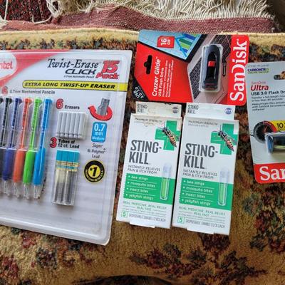 Smalls New mechanical pencils, wasp/bee sting swabs, flash drives