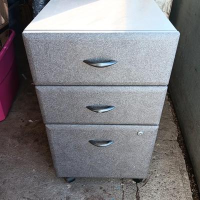 Three drawer filing cabinet on wheels