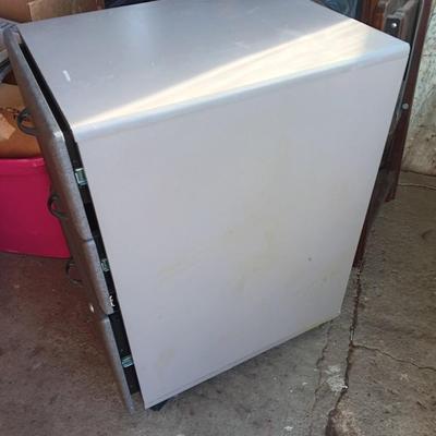 Three drawer filing cabinet on wheels