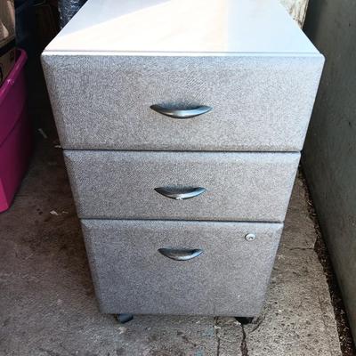Three drawer filing cabinet on wheels