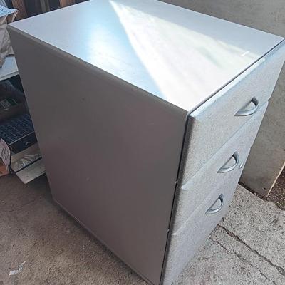 Three drawer filing cabinet on wheels