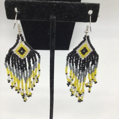 Yellow beaded dangle earrings