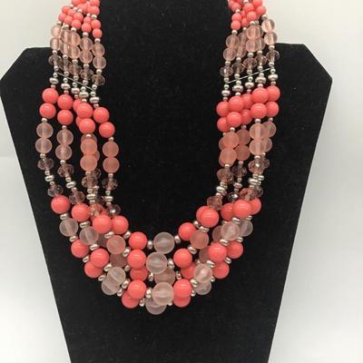 Bulky pink and peach colored necklace