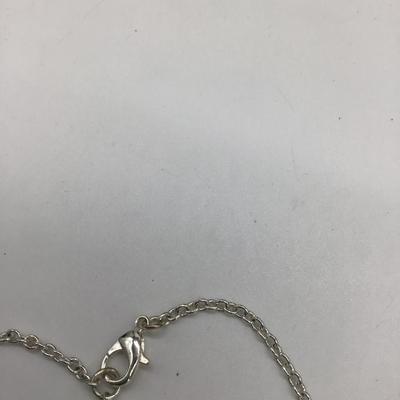 LC creme colored necklace