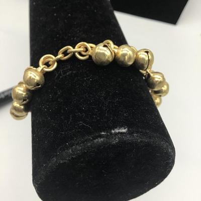 Gold toned bell bracelet