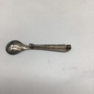 Rusty spoon pin