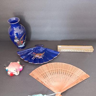 Blue vase with porcelain fan dish a wood varved fan and a vintage circle of friends pin cushion