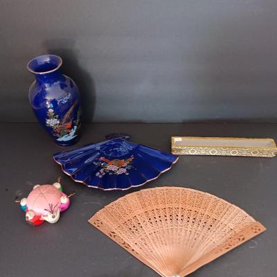 Blue vase with porcelain fan dish a wood varved fan and a vintage circle of friends pin cushion