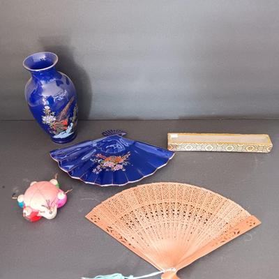 Blue vase with porcelain fan dish a wood varved fan and a vintage circle of friends pin cushion