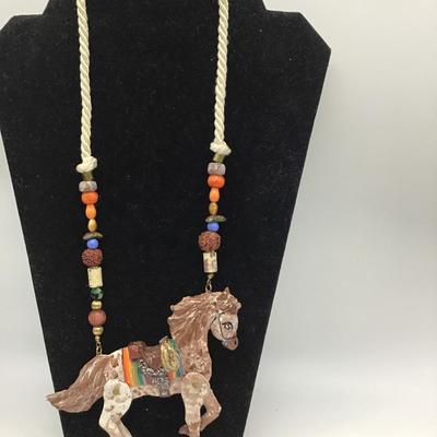 Hand painted and signed by Korian Designs moveable legs horse necklace