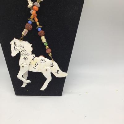 Hand painted and signed by Korian Designs moveable legs horse necklace