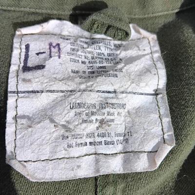 Military issued sleeping bag. - bed cushions - coveralls - and a waterproof military bag cover