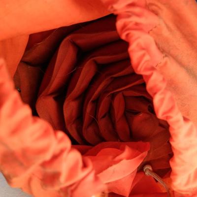 Military issued sleeping bag. - bed cushions - coveralls - and a waterproof military bag cover