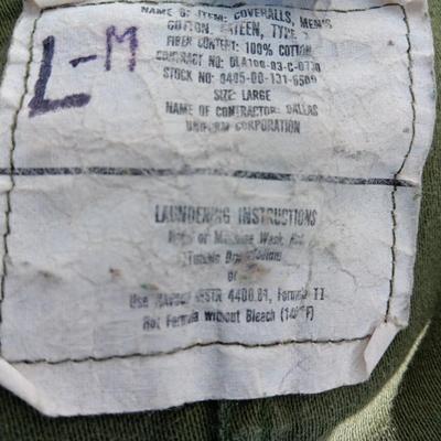 Military issued sleeping bag. - bed cushions - coveralls - and a waterproof military bag cover