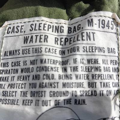 Military issued sleeping bag. - bed cushions - coveralls - and a waterproof military bag cover