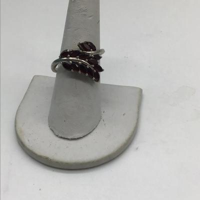925 silver ring with ruby colored stones