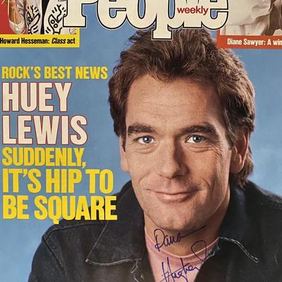 Huey Lewis
signed magazine cover