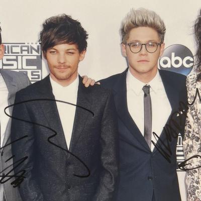One Direction band signed photo