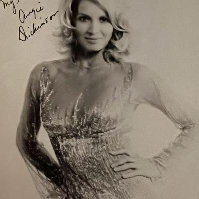 Angie Dickinson facsimile signed photo. 3x5 inches