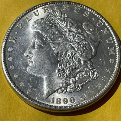 1890-P NICE BRILLIANT UNCIRCULATED MORGAN SILVER DOLLAR AS PICTURED.