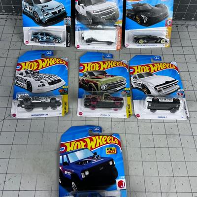 7 Hot Wheels NEW ON THE CARD