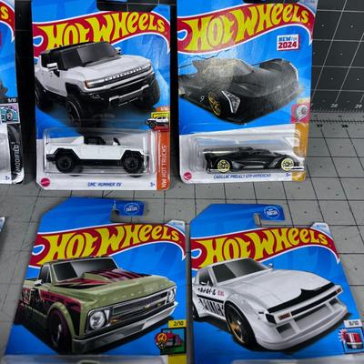 7 Hot Wheels NEW ON THE CARD