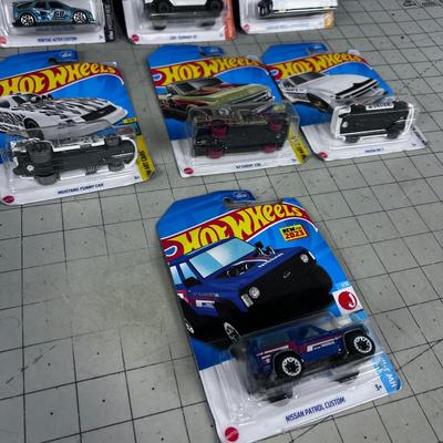 7 Hot Wheels NEW ON THE CARD