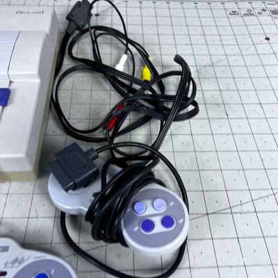 Super Nintendo with Controllers and Power Cord