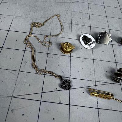 A Bunch of Pins and Tie Tacks 