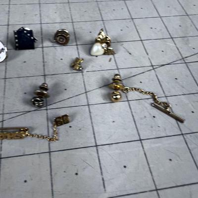 A Bunch of Pins and Tie Tacks 