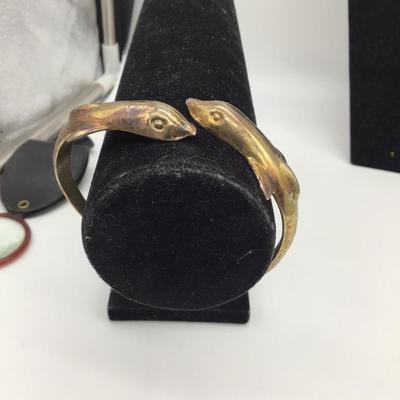 Gold toned dolphin bracelet