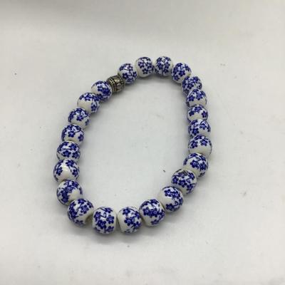 White beads with blue flowers bracelet