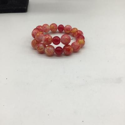 Light pink, hot pink and yellow beaded bracelet