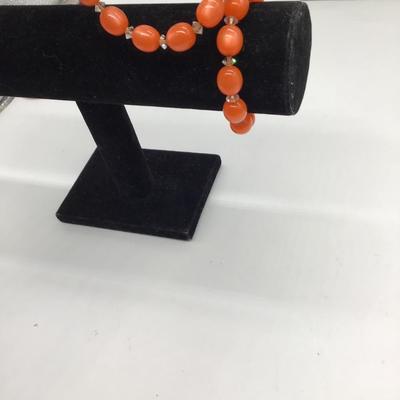 Orange beaded spiral, twistable bracelet