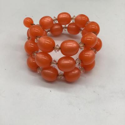 Orange beaded spiral, twistable bracelet