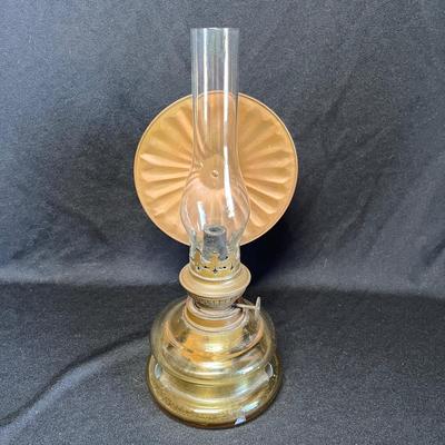 Antique wall hanging oil lamp
