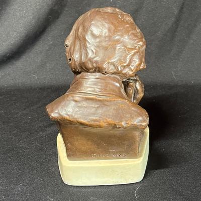 Bronze colored sculpture