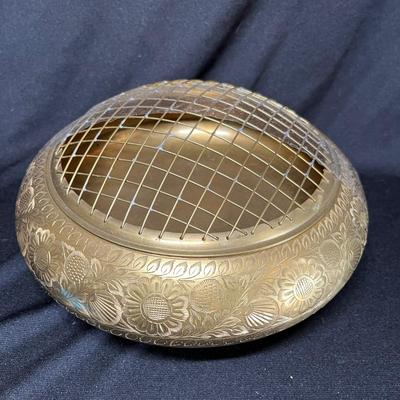 Brass oriental flower arranger