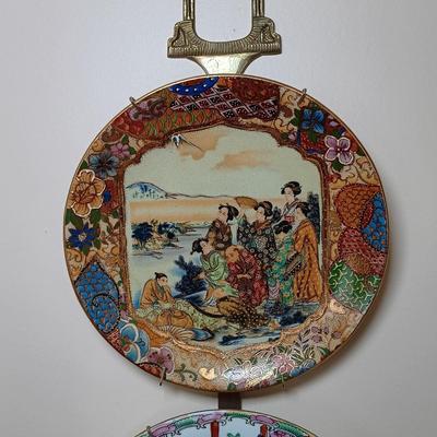 LOT 77: Set of 3 Satsuma-Style and Famille Rose Chinese Plates on Brass Wall Display w/ Floral Arrangement