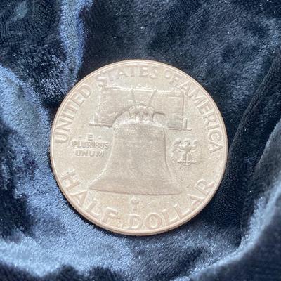 LOT 160: Two Silver Franklin Half Dollar Coins