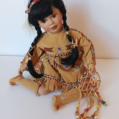 Porcelain Native American doll