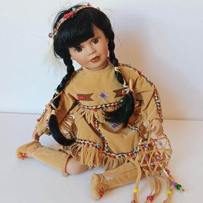 Porcelain Native American doll