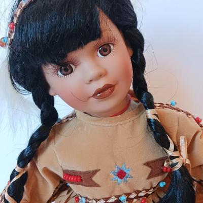 Porcelain Native American doll