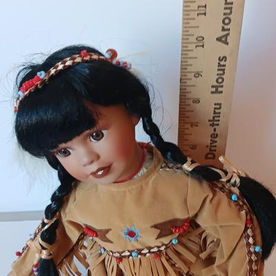 Porcelain Native American doll