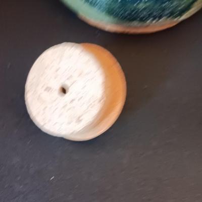 Three abstract chickens and a clay pottery picture