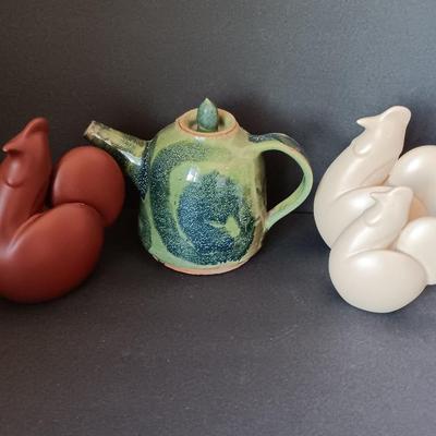 Three abstract chickens and a clay pottery picture