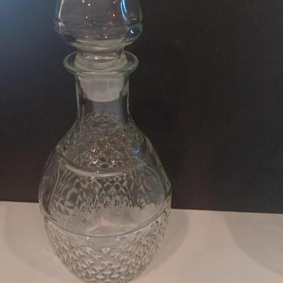 Two matching Princess House decanters with six green stemmed glasses