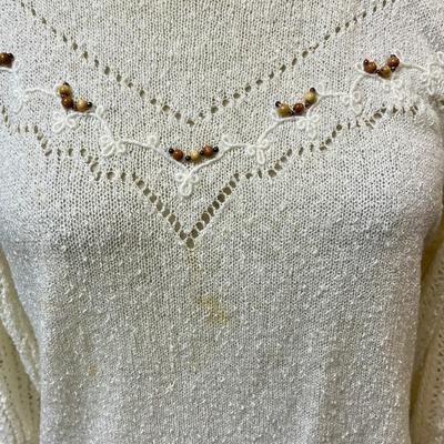 Erika size 42 Vintage Sweater with wood bead design on front
