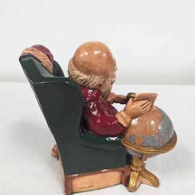 Santa Claus Looking Over World Globe Ceramic